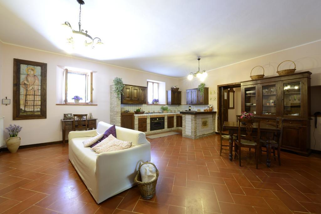 Maison d'hôtes Le Querce Di Assisi à Piano Delle Pieve Extérieur photo